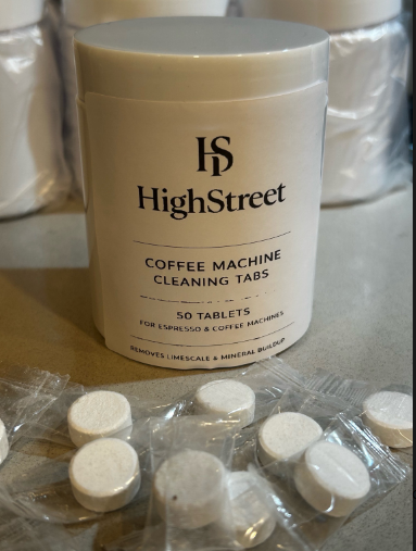Bottle of HighStreet Coffee Machine Cleaning Tabs with individually wrapped tablets